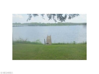 Nice size Front yard, water access and private doc