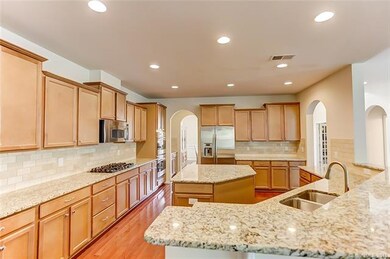 Tiled Back Splash and Staggered Cabinetry