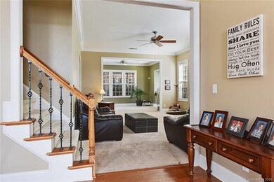 Living room entry, sunroom in background