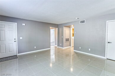 Entry into Living Room with new ceramic tile and t