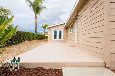 Private side concrete patio area.