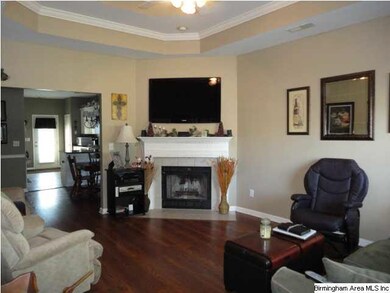 Great Room w/Trey Ceiling & Crown Molding