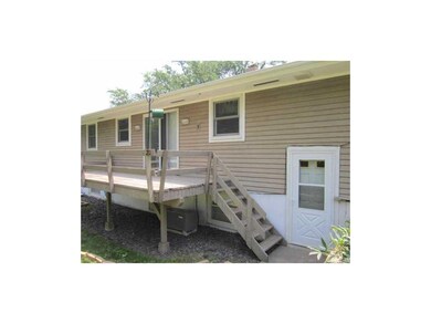 Exterior Back. Slider with deck leading to huge ba