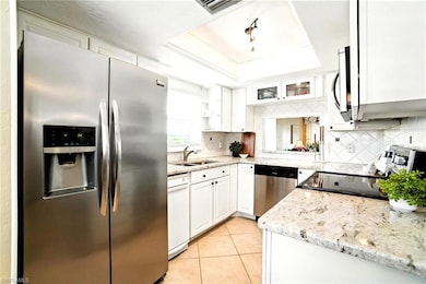 366 Charlemagne Blvd unit 201, Naples, FL 34112 - photo 2