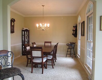 Dining Room. Formal dining room with crown molding