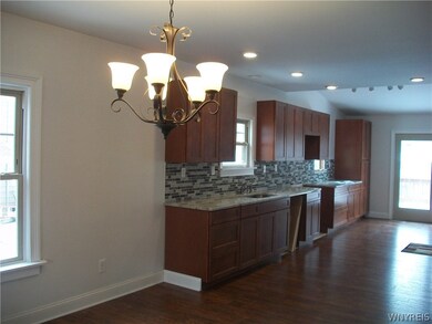 Granite counters and french doors to deck