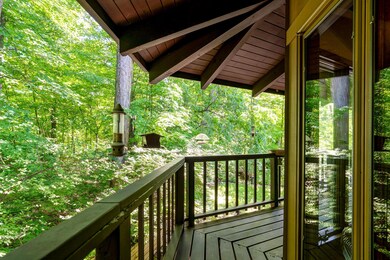 Balcony w/ wooded views