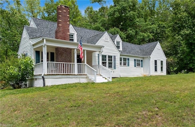 Beutiful home with front porch and large deck