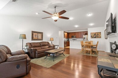 Great room features volume ceilings