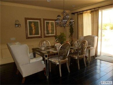 Dinning Area in Living Room with View to the back 