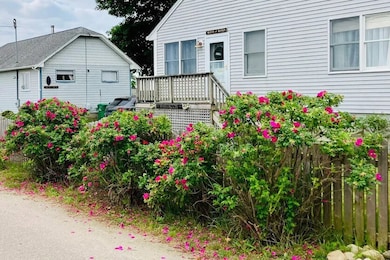 Perfect beach cottage with a picket fence and beac