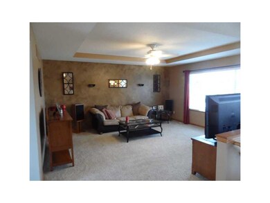 Living Room. Inverted tray detail in the ceiling a