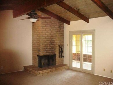 Living Room with fireplace, French door to enclose