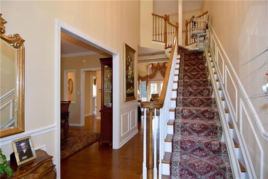 Two-Story Foyer:  Hardwood flooring, large window 
