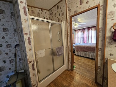 Main bathroom 12'x8'. With walk in shower.