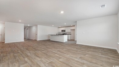 Unfurnished living room with light wood-type floor