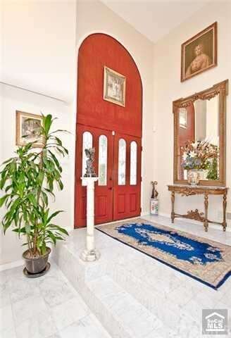 Leaded Glass Front Doors to Sunken Living Room