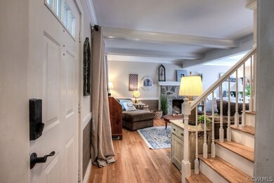 Inside, you'll find stunning hardwood floors in the main living areas