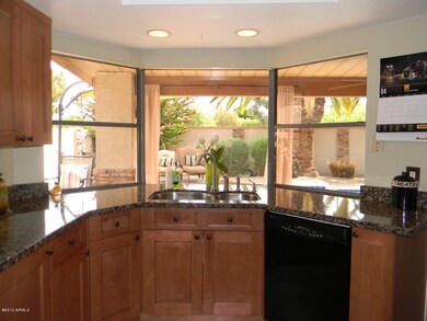 KITCHEN VIEW OF BACK YARD