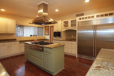 Gas range and kitchen view
