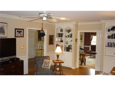 Family Room w/ Built-in Book Cases and Pocket door