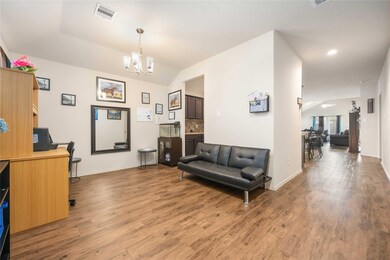 Step on in! This can be a lovely formal dining area, office or study. You choose!