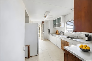 Enhanced photo of upstairs kitchen with virtual decluttering