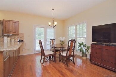 Breakfast area with direct access to the kitchen for easy morning routines.