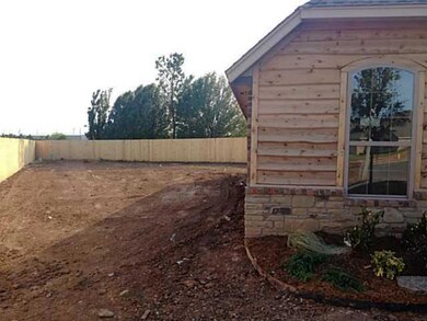 Exterior Front. Huge Side Yard is fenced with spri