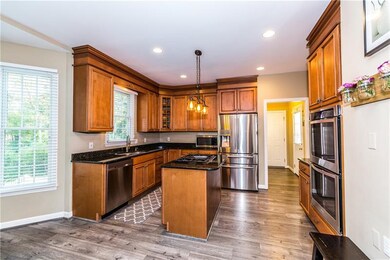 Equipped kitchen with granite counters and <2 year
