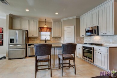 Kitchen area is set off the living room. Nice size