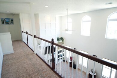 Hallway overlooking family room