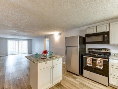 9911 Aquarius Dr unit 7, Port Richey, FL 34668 - photo 3