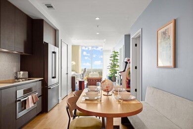 Dining area with light wood-style flooring and re