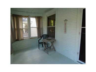 Porch-Front. Enclosed 3 season porch