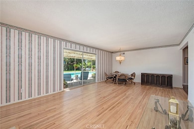 Living room sliding glass doors open to the patio