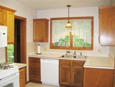 Beautiful oak cabinetry and newer appliances in Ki