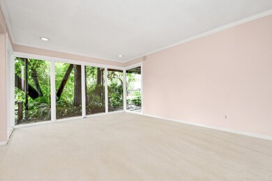 This expansive living room boasts stunning floor t