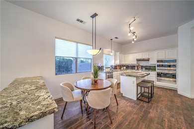 The recently updated kitchen cabinets add a touch