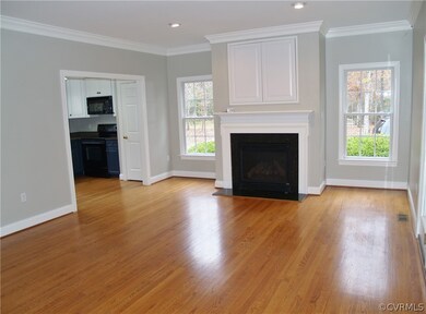 Gas Fireplace, 9' Ceilings, and Crown Moulding in