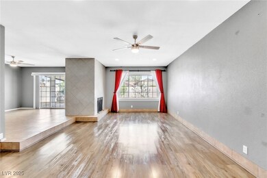 Unfurnished room with baseboards, wood finished fl