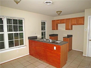 KITCHEN, TILE FLOOR, PANTRY/LAUNDRY ROOM COMBINED,