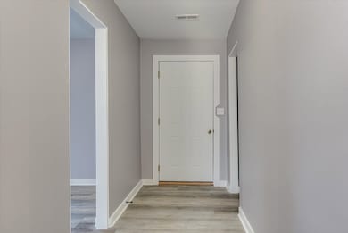 Entrance with hall closet