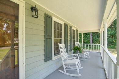 Balcony featuring covered porch