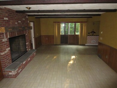 Family Room. Large family with a huge fireplace.