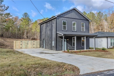 View of front property with covered porch and a fr