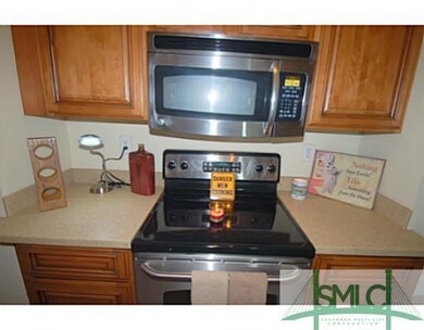 Kitchen. Built in microwave and stove below with g