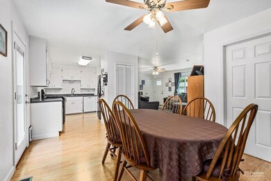 Spacious eat-in kitchen and full-size pantry.  New lighting, flooring, fresh interior paint.