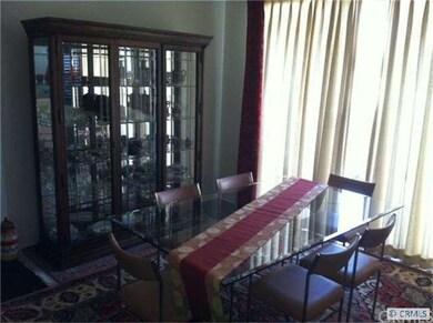 Formal dining room with slider leading out to the 