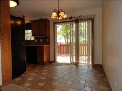 Diningroom has updated lighting and tiled flooring